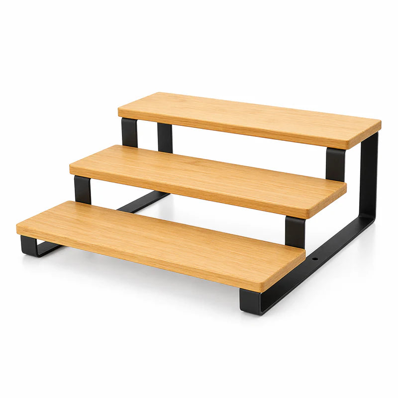 Three-step wooden platform with black metal frame on a white background